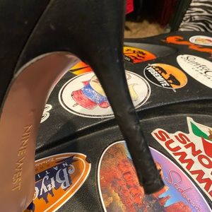 Nine West black high heels.